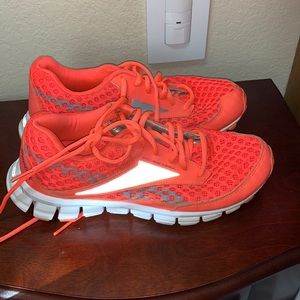 REEBOK bright red running shoes